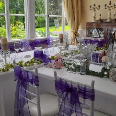 About Us - Purple chairs